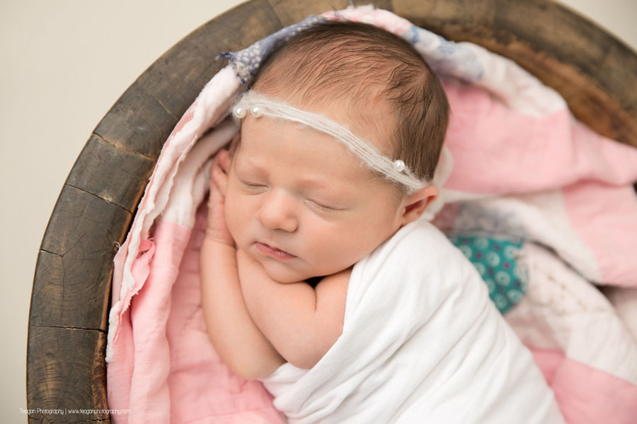 a close up of a newborn baby girl in an Edmonton newborn photo session
